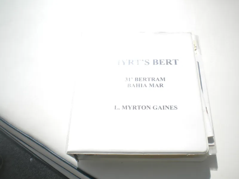Slide: The Image of Binder labeled "31' Bertram Bahia Mar, L. Myrton Gaines" on a white surface. - 18