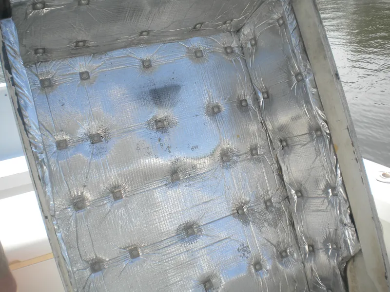 Slide: The Image of Interior view of a 1968 Bertram 31 Bahia Mar boat with metallic insulation. - 20