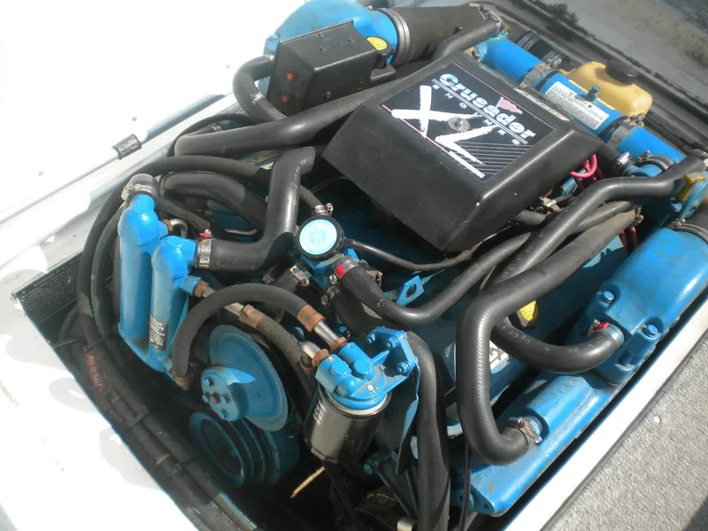 Slide: The Image of 1968 Bertram 31 Bahia Mar engine with Crusader XL components, featuring blue and black detailing. - 24