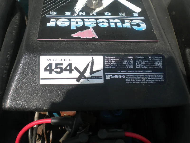 Slide: The Image of Engine cover of a 1968 Bertram 31 Bahia Mar with Crusader 454 XL Series label. - 25