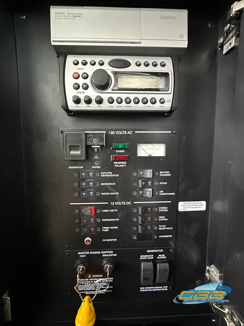 Slide: The Image of Control panel of a 2006 Sea Ray 290 Sundancer boat with audio system. - 35