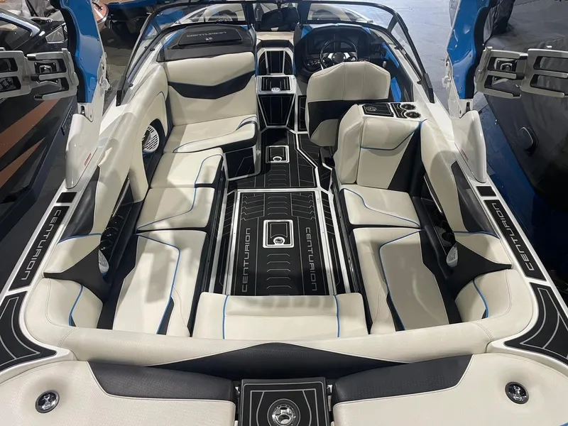 Slide: The Image of 2020 Centurion Ri237 boat interior with luxurious seating and modern design. - 10
