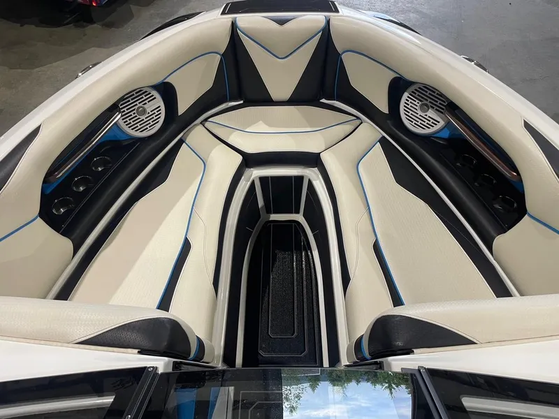 Slide: The Image of 2020 Centurion Ri237 boat interior with sleek seating and modern design. - 8