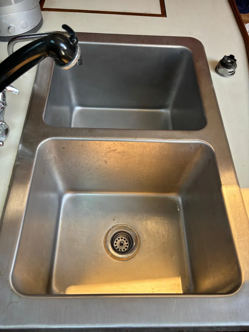 Slide: The Image of Stainless steel double sink on 1989 Ericson Yachts 34. - 13