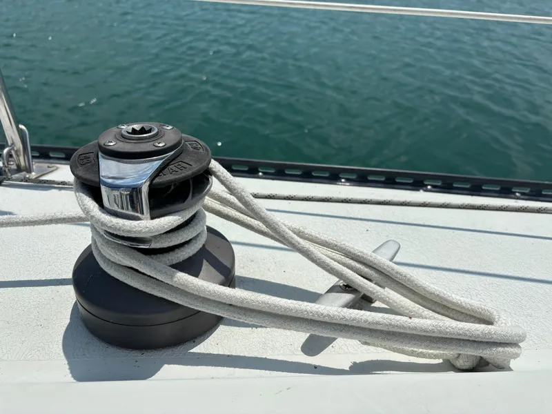 Slide: The Image of Close-up of a winch and rope on a 1989 Ericson Yachts 34 sailboat. - 17