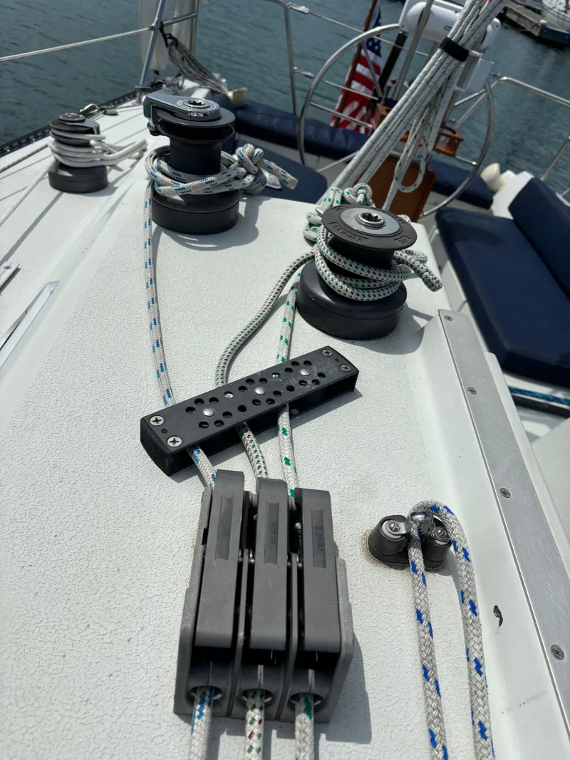 Slide: The Image of Close-up of 1989 Ericson Yachts 34 sailboat deck with winches and ropes. - 21