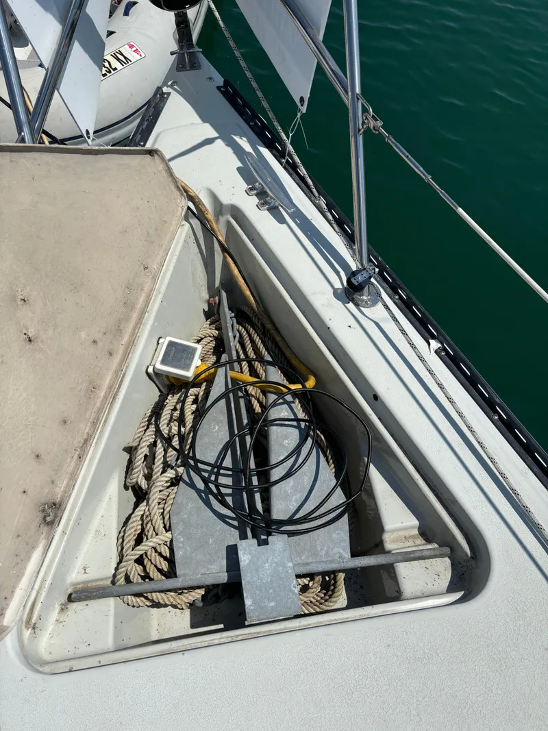 Slide: The Image of Anchor locker of 1989 Ericson Yachts 34 with ropes and cables. - 4