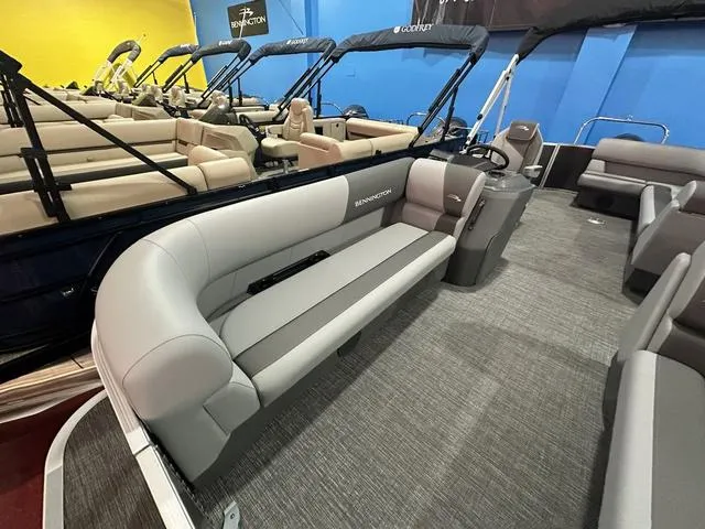 Slide: The Image of 2025 Bennington 21 SL pontoon boat interior with gray seating and modern design. - 5