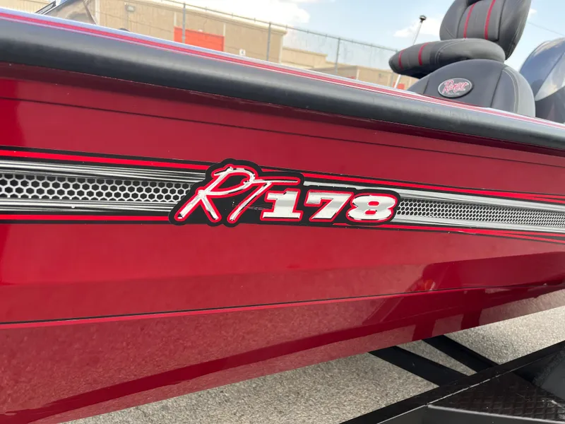 Slide: The Image of 2016 Ranger RT 178 Tournament Edition boat, red exterior with logo detail. - 12