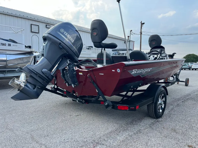 Slide: The Image of 2016 Ranger RT 178 Tournament Edition boat with Yamaha motor, parked outdoors. - 22