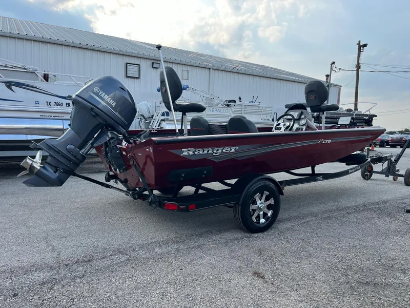 Slide: The Image of 2016 Ranger RT 178 Tournament Edition boat with Yamaha motor, parked outdoors. - 23