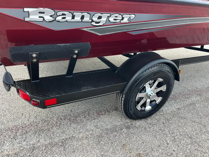 Slide: The Image of 2016 Ranger RT 178 Tournament Edition boat trailer, red with black fender and chrome wheel. - 24