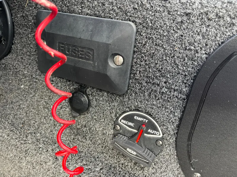 Slide: The Image of 2016 Ranger RT 178 Tournament edition boat panel with fuse box and control dial. - 47