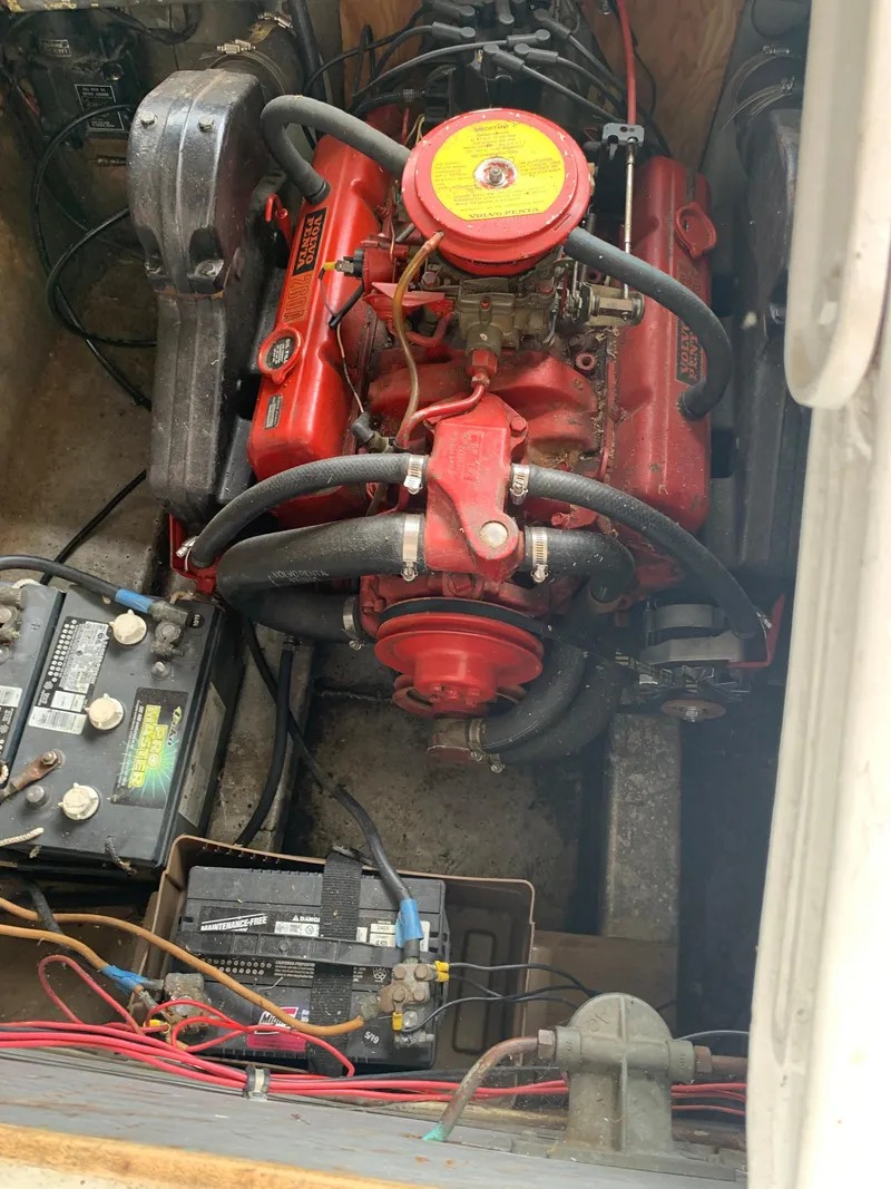 Slide: The Image of 1965 Lazy Days Custom engine with red components and visible wiring. - 27