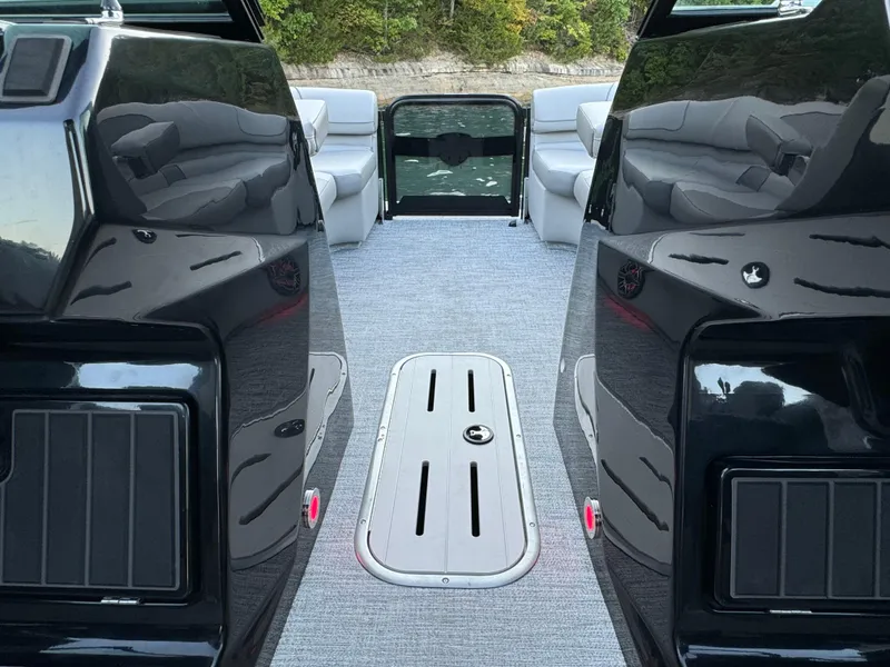 Slide: The Image of 2024 Premier 250 Solaris boat interior with sleek black design and comfortable seating. - 14