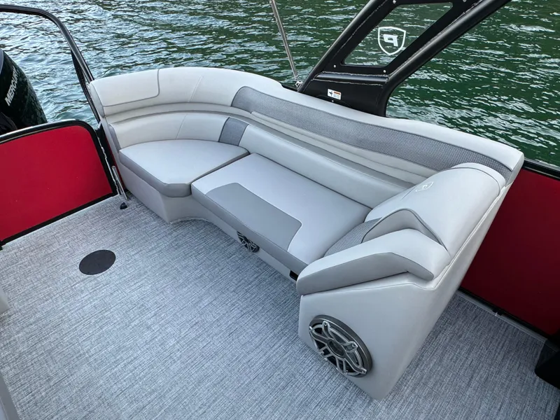 Slide: The Image of 2024 Premier 250 Solaris boat interior with gray seating and modern design. - 23