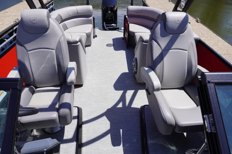 Slide: The Image of 2024 Premier 250 Solaris boat interior with luxurious gray seating and modern design. - 3
