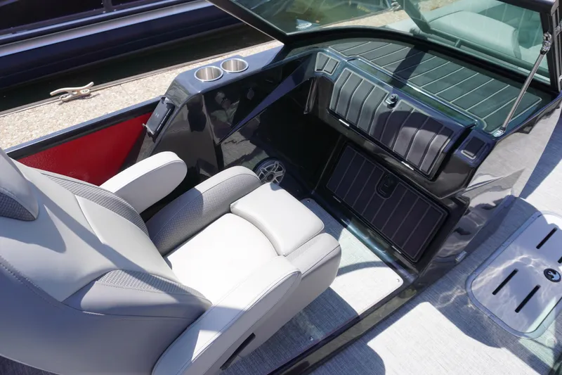 Slide: The Image of 2024 Premier 250 Solaris boat interior with modern seating and dashboard design. - 5
