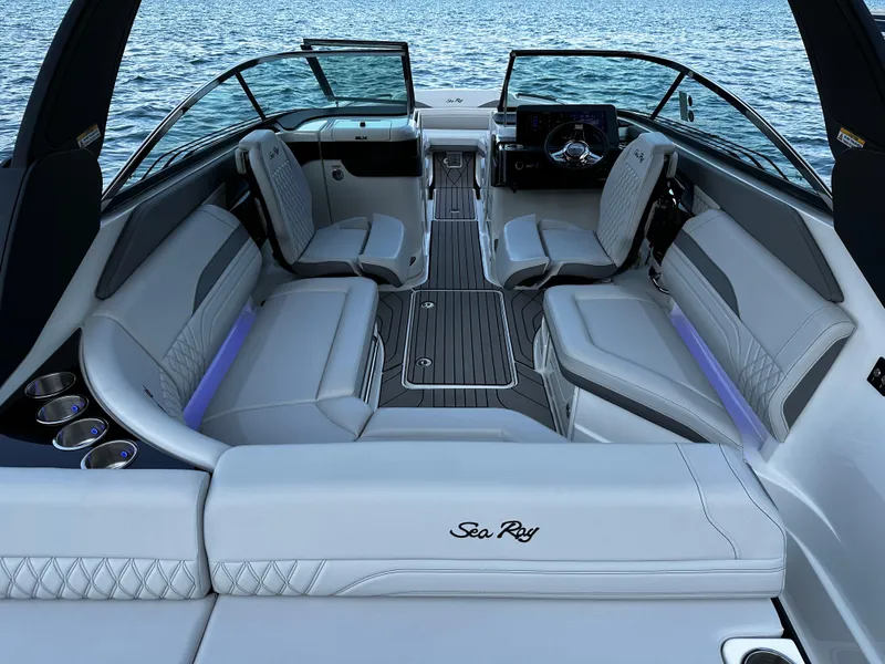 Slide: The Image of 2025 Sea Ray SLX 260 boat interior with luxurious seating and modern design. - 12