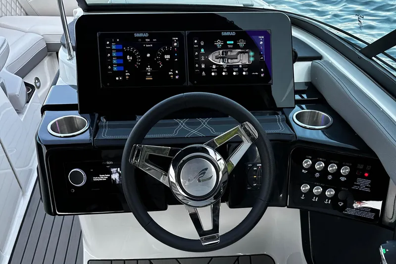 Slide: The Image of 2025 Sea Ray SLX 260 helm with modern controls and digital displays. - 20