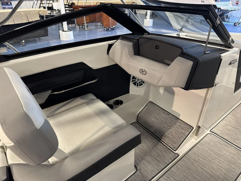 Slide: The Image of 2025 Cobalt CS22 boat interior with modern seating and sleek design. - 13