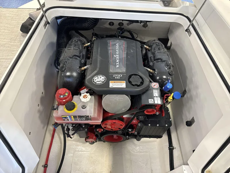 Slide: The Image of 2025 Cobalt CS22 boat engine compartment with Volvo Penta 250 V6 engine. - 18