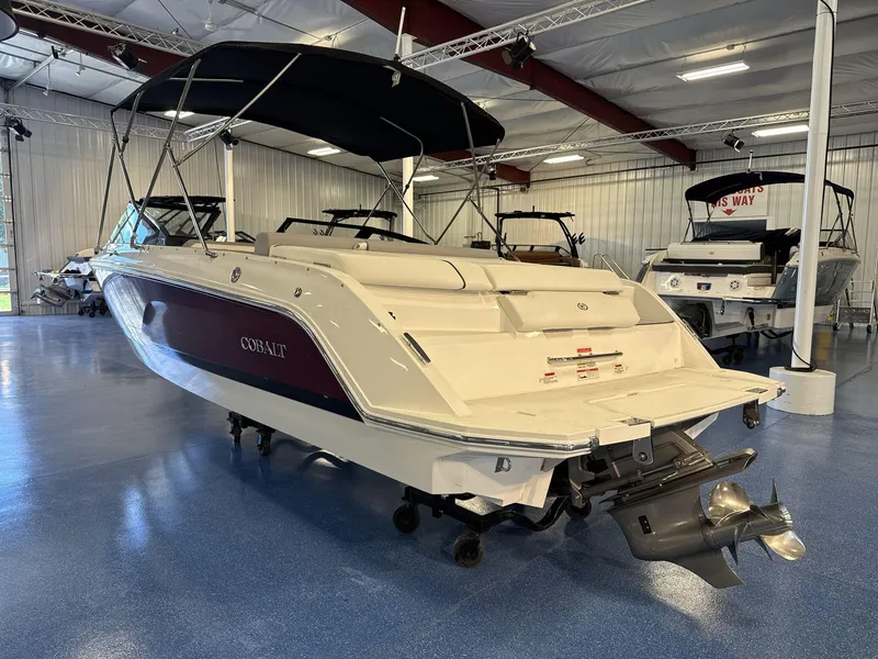 Slide: The Image of 2025 Cobalt CS22 boat in showroom, featuring sleek design and modern amenities. - 5