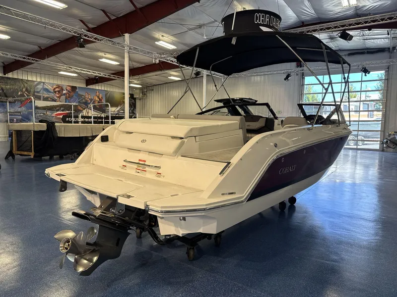 Slide: The Image of 2025 Cobalt CS22 boat in showroom, featuring sleek design and modern amenities. - 7