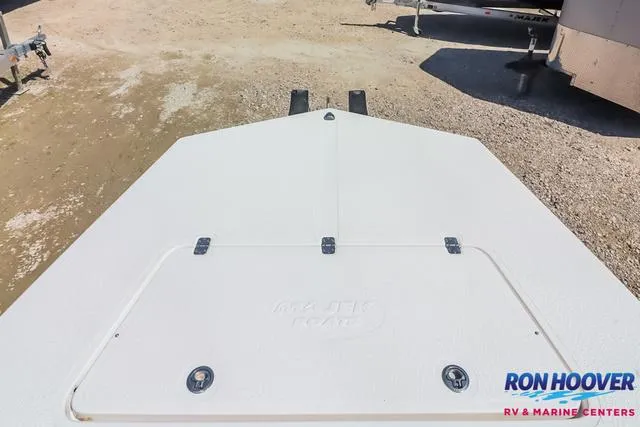 Slide: The Image of 2024 Majek Boats 18 M2 displayed indoors at Ron Hoover RV & Marine Centers. - 12