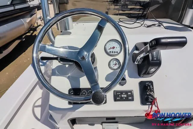 Slide: The Image of 2024 Majek Boats 18 M2 console with steering wheel and seating at Ron Hoover RV & Marine Centers. - 17