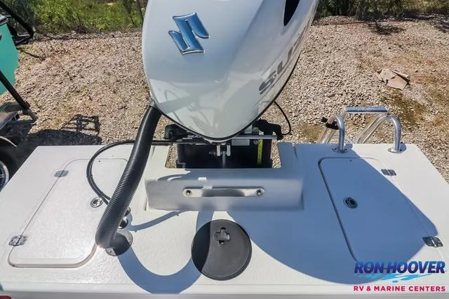 Slide: The Image of 2024 Majek Boats 18 M2 dashboard with steering wheel and controls. - 18