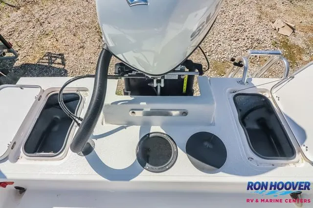 Slide: The Image of 2024 Majek Boats 18 M2 interior storage compartment with seating. - 19