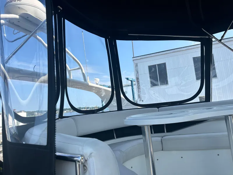 Slide: The Image of Interior view of 2004 Carver 420 Mariner yacht with seating and table. - 10