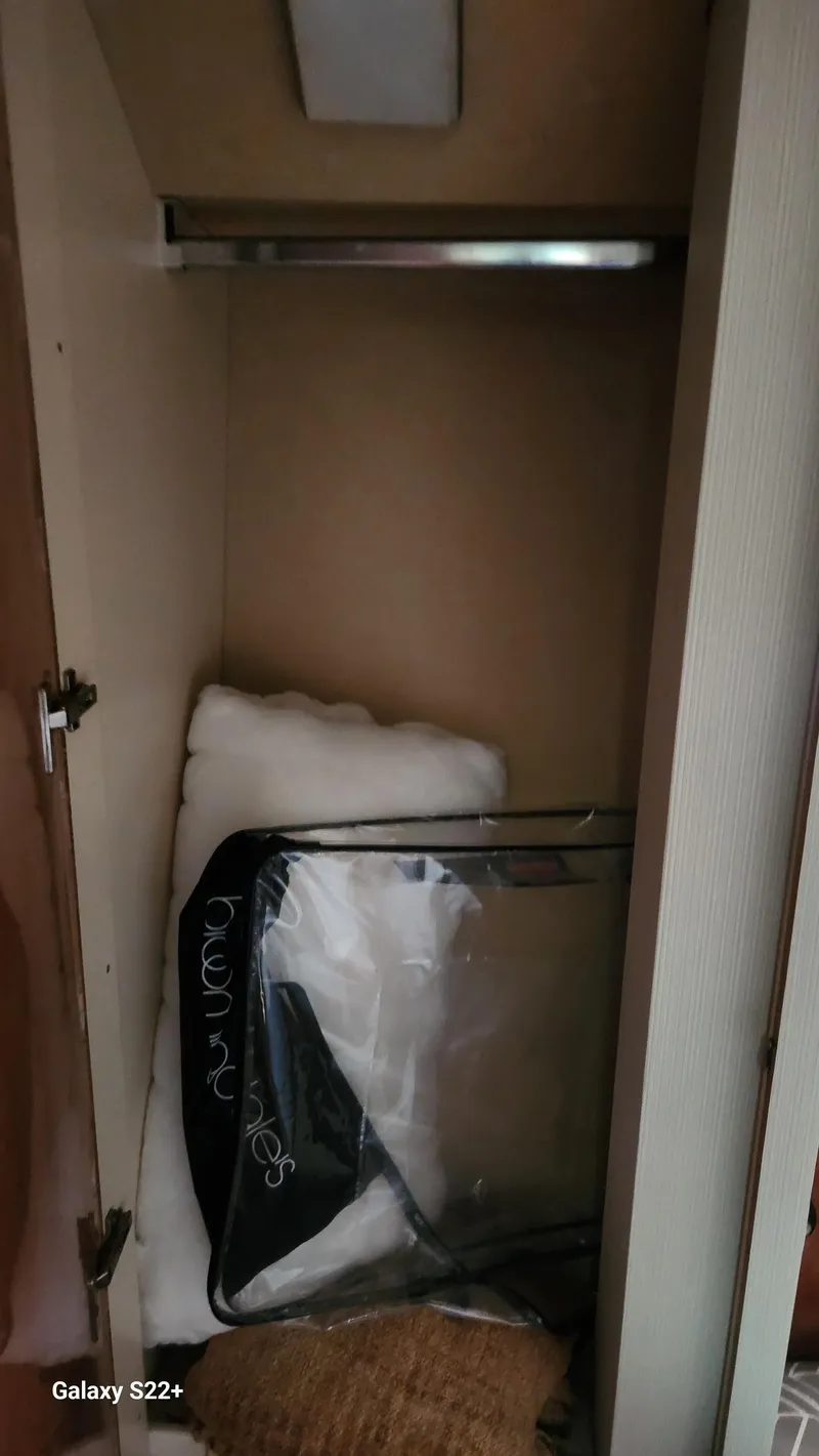 Slide: The Image of Empty closet in 1998 Ferretti Yachts 55 Motor Yacht interior. - 22