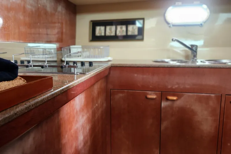 Slide: The Image of Luxurious kitchen interior of 1998 Ferretti Yachts 55 Motor Yacht. - 29