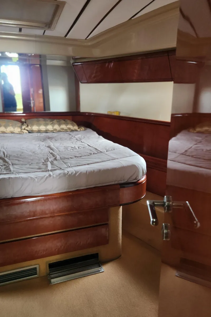 Slide: The Image of Luxurious bedroom interior of 1998 Ferretti Yachts 55 Motor Yacht. - 38