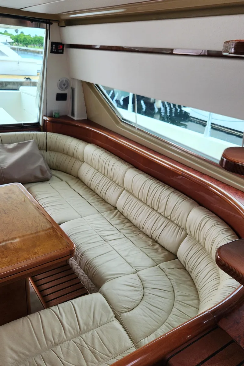 Slide: The Image of Luxurious interior of 1998 Ferretti Yachts 55 Motor Yacht with leather seating. - 46