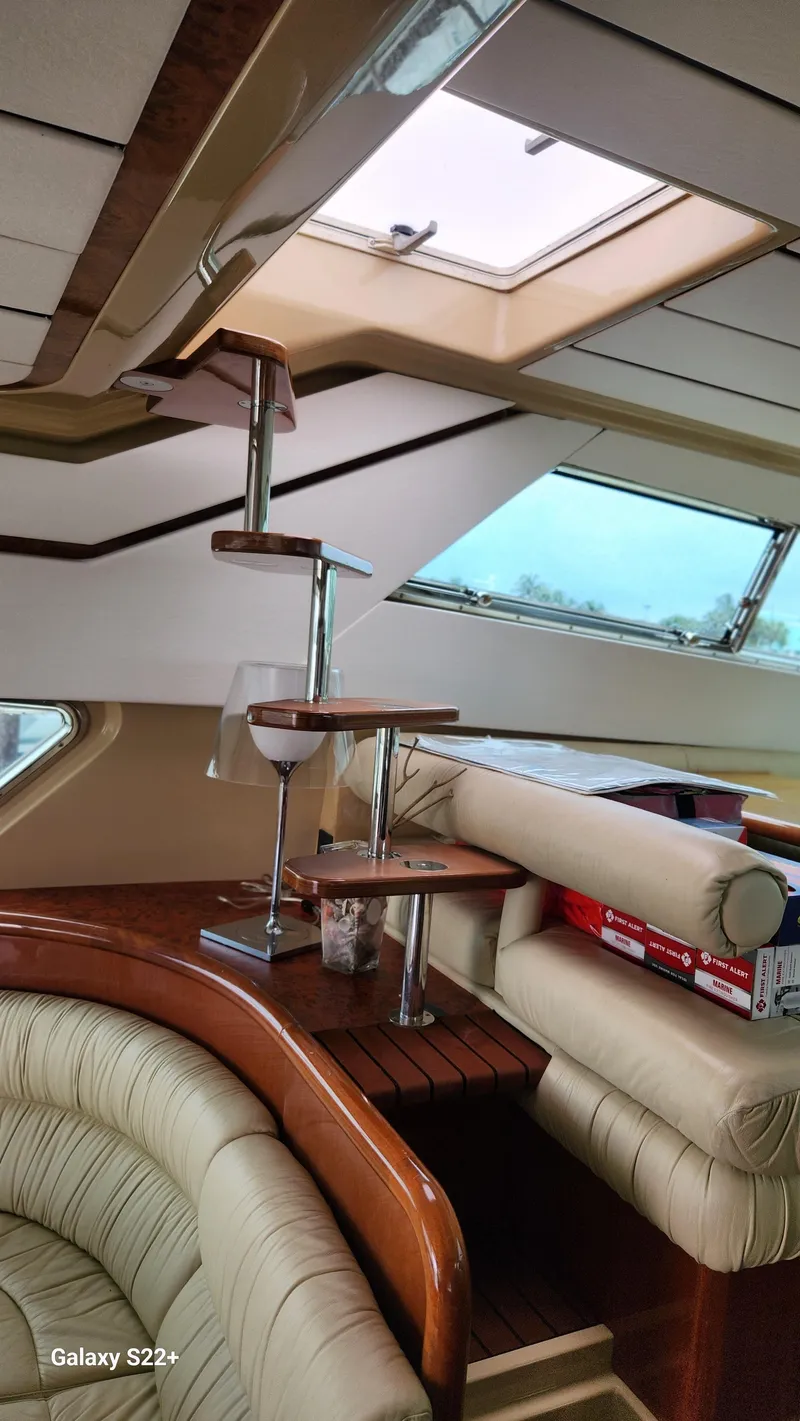 Slide: The Image of Luxurious interior of a 1998 Ferretti Yachts 55 Motor Yacht with elegant staircase. - 7