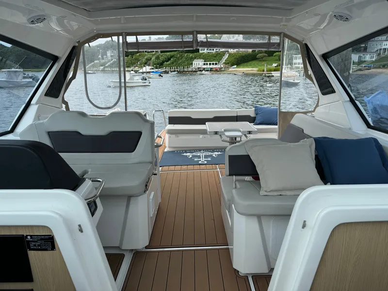 Slide: The Image of Interior of 2020 Aquila 36 Sport yacht with luxurious seating and scenic water view. - 10