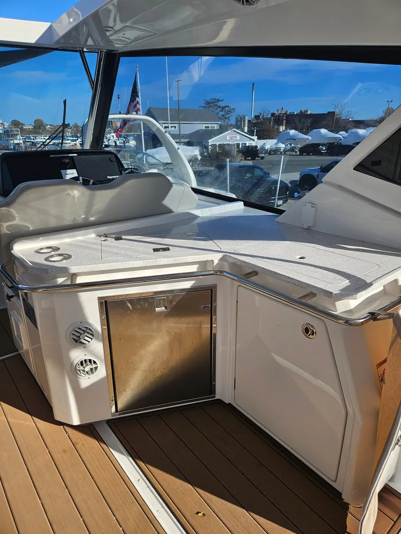 Slide: The Image of 2020 Aquila 36 Sport yacht interior with sleek kitchen area and modern design. - 14