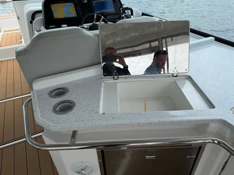 Slide: The Image of Aquila 36 Sport 2020 yacht interior with sink and navigation equipment. - 16