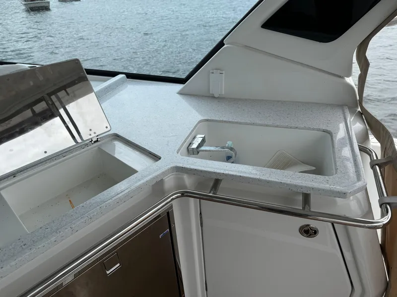 Slide: The Image of Aquila 36 Sport 2020 boat interior with sleek countertop and sink. - 17