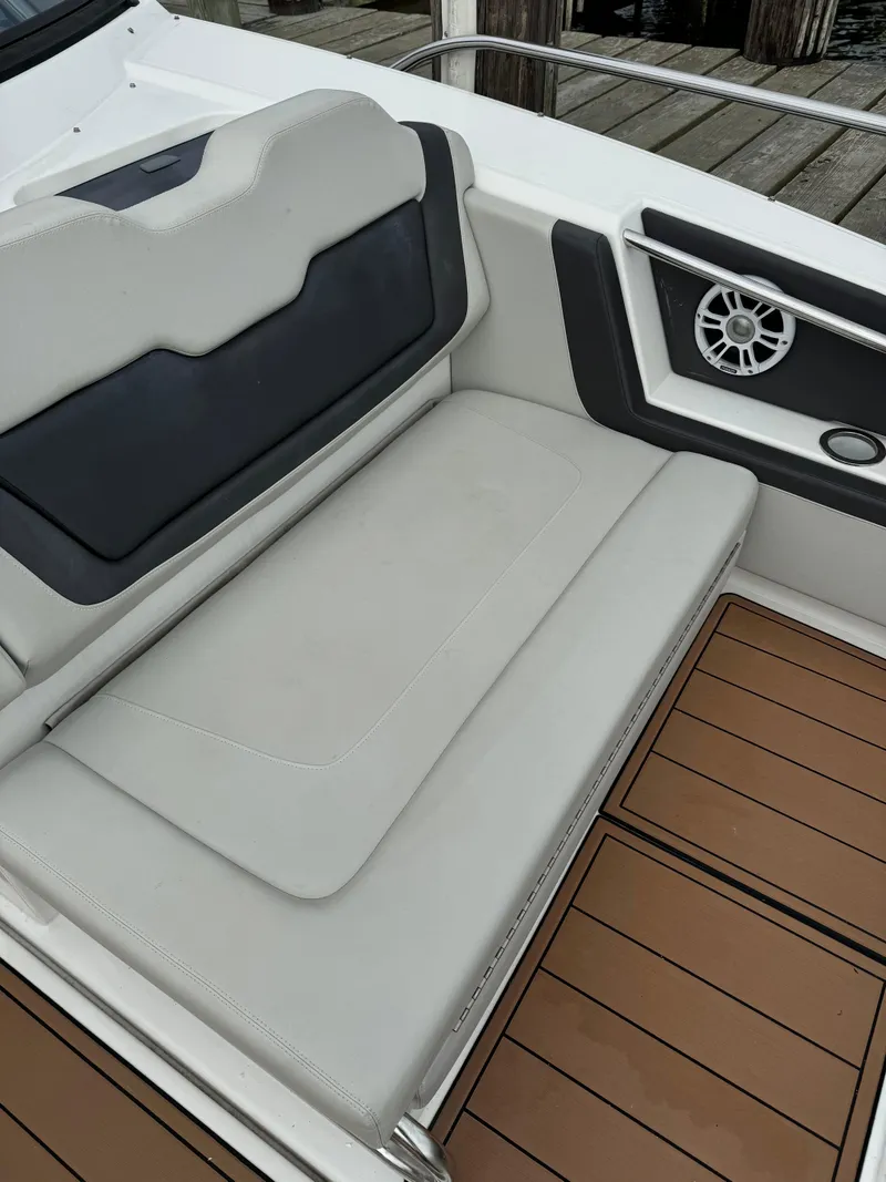 Slide: The Image of Aquila 36 Sport 2020 boat interior with cushioned seating and speaker. - 30