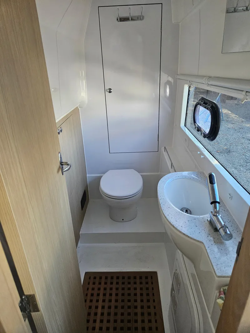 Slide: The Image of 2020 Aquila 36 Sport bathroom interior with modern fixtures and compact design. - 37