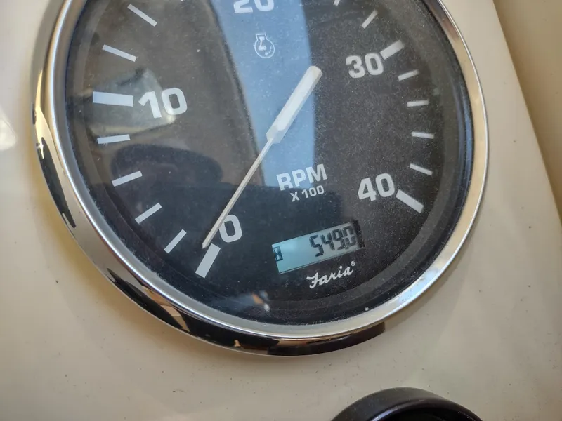 Slide: The Image of Close-up of 2008 Mainship 30 Pilot II Sedan tachometer showing 5499 RPM. - 24