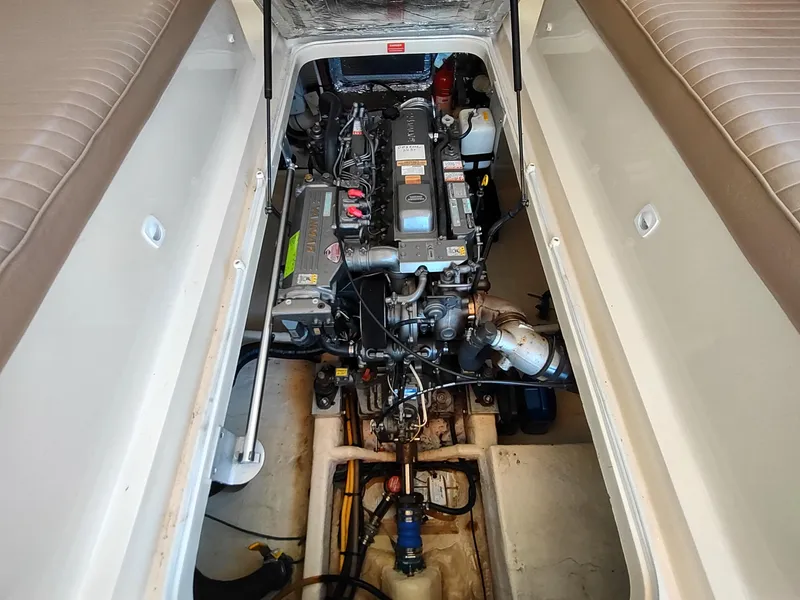 Slide: The Image of 2008 Mainship 30 Pilot II Sedan engine compartment, showcasing detailed mechanical components. - 39
