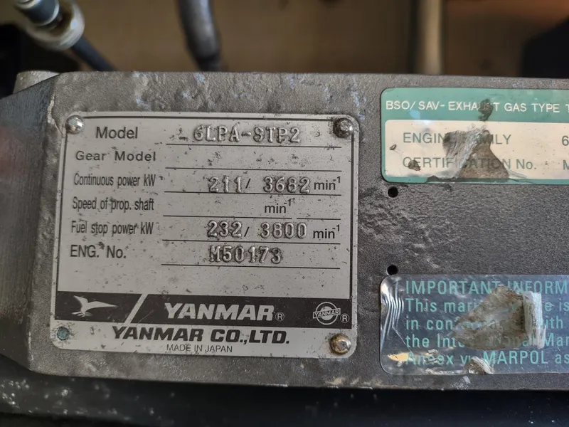 Slide: The Image of Yanmar engine plate on 2008 Mainship 30 Pilot II Sedan, model 6LPA-STP2. - 40