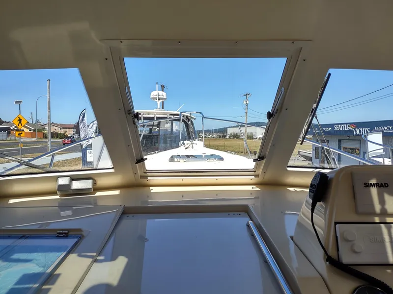 Slide: The Image of 2008 Mainship 30 Pilot II Sedan interior view with navigation equipment. - 45