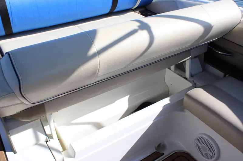 Slide: The Image of 2019 Formula 270 Bowrider boat interior with open storage compartment. - 10