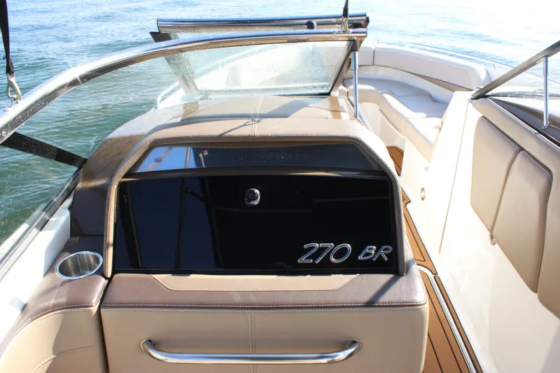 Slide: The Image of 2019 Formula 270 Bowrider interior with sleek dashboard and seating. - 2